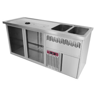 Bar counter with 2 compartments, draining board + grid, 2 sinks on the right.