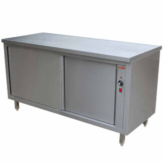 Working table on heating cupboard
